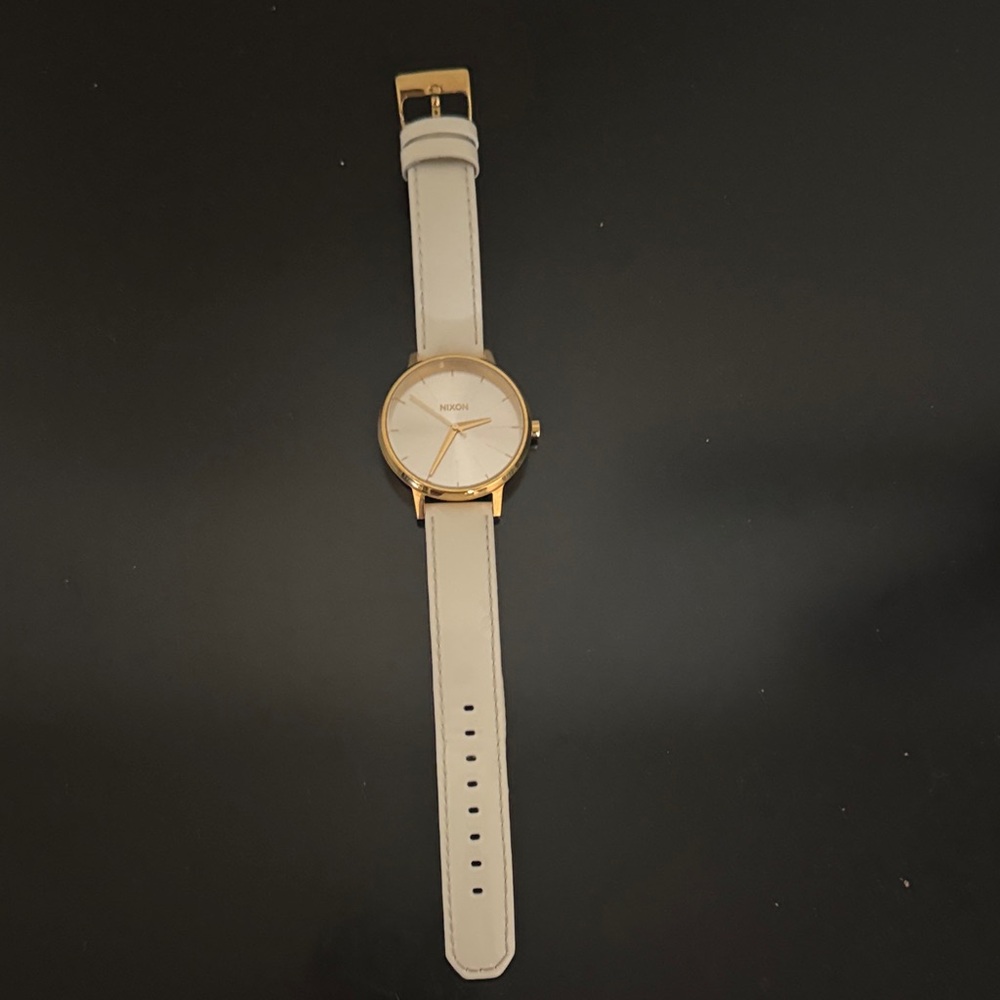 Gold and white watch